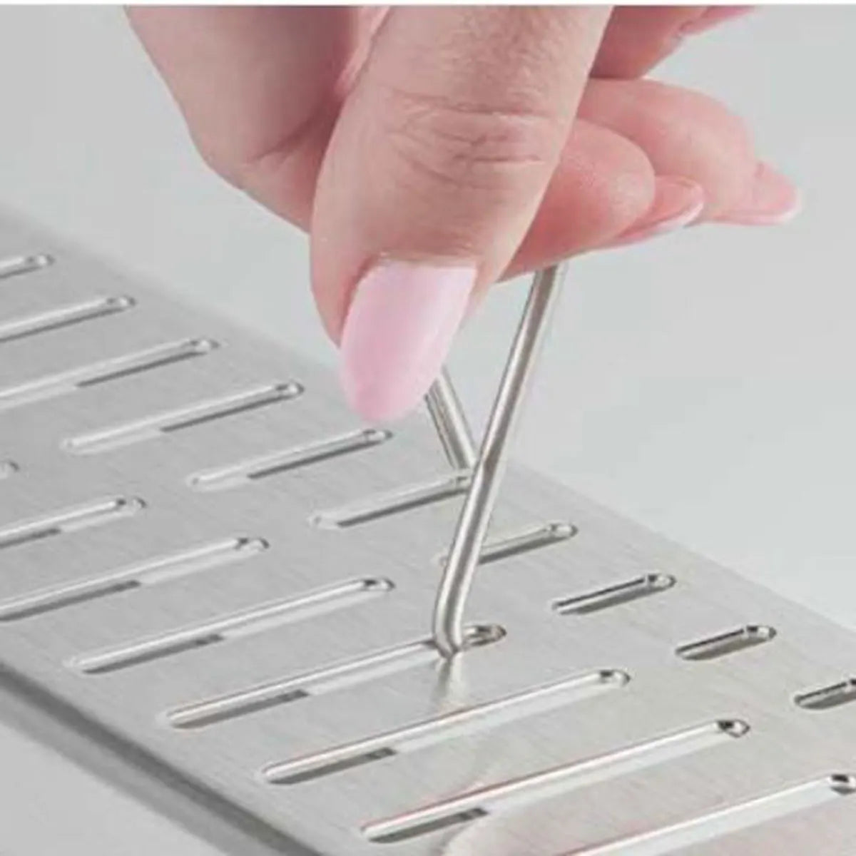 lift key for shower grate