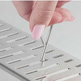 lift key for shower grate