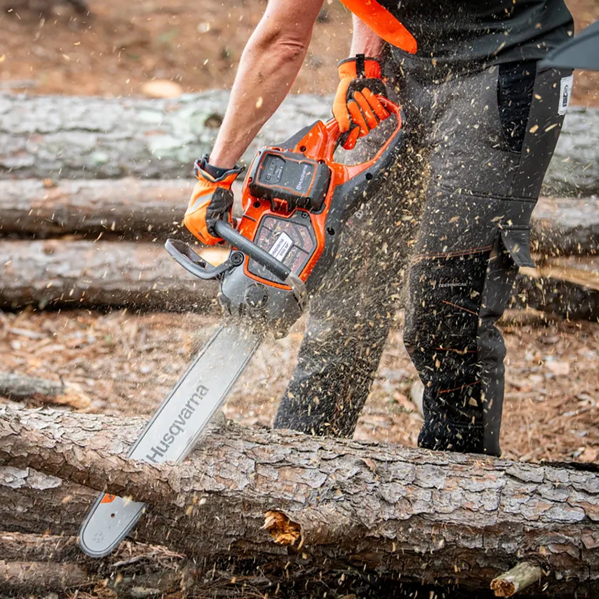 Husqvarna 550i XP Electric Chainsaw In Use
