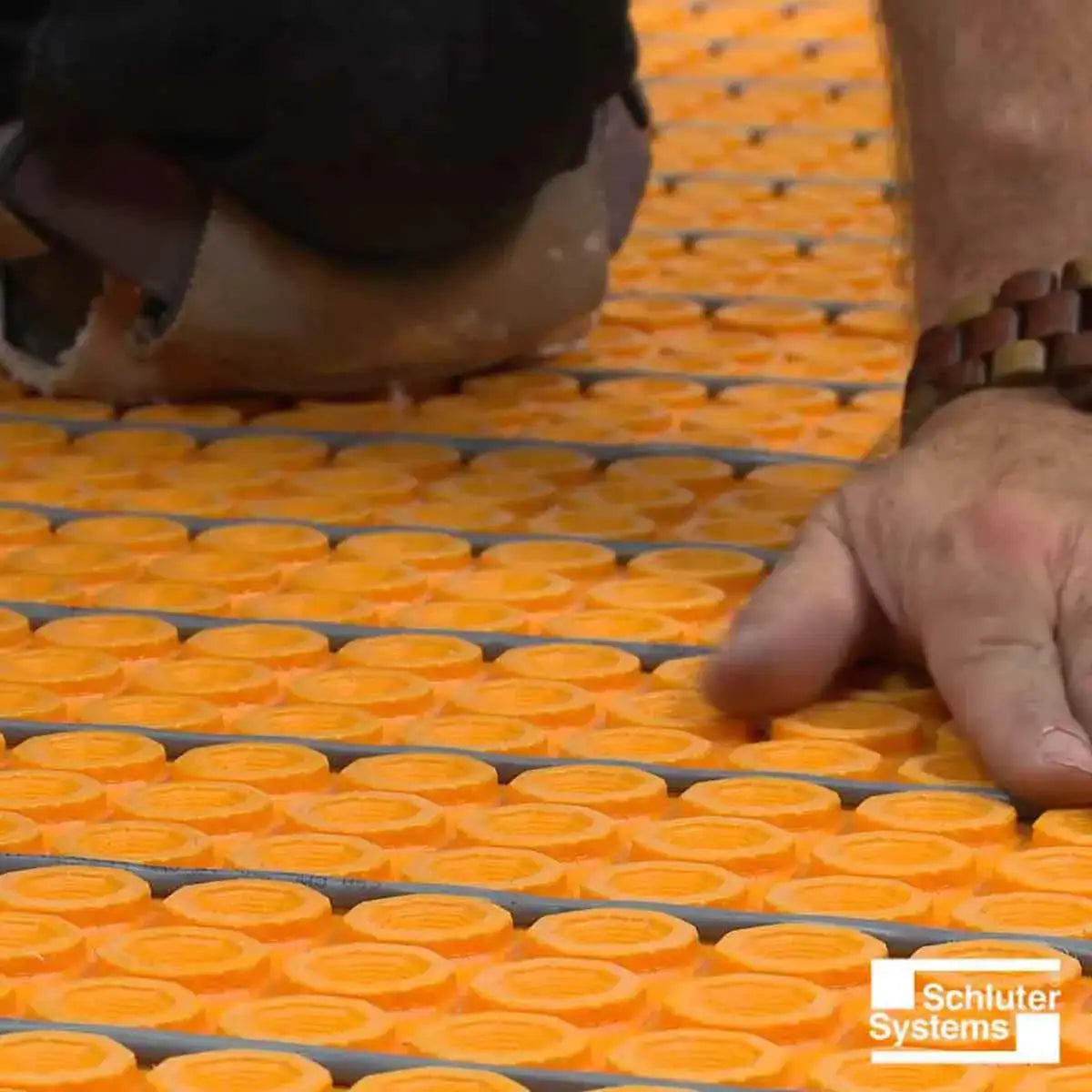 Laying Schluter DITRA-HEAT Membrane