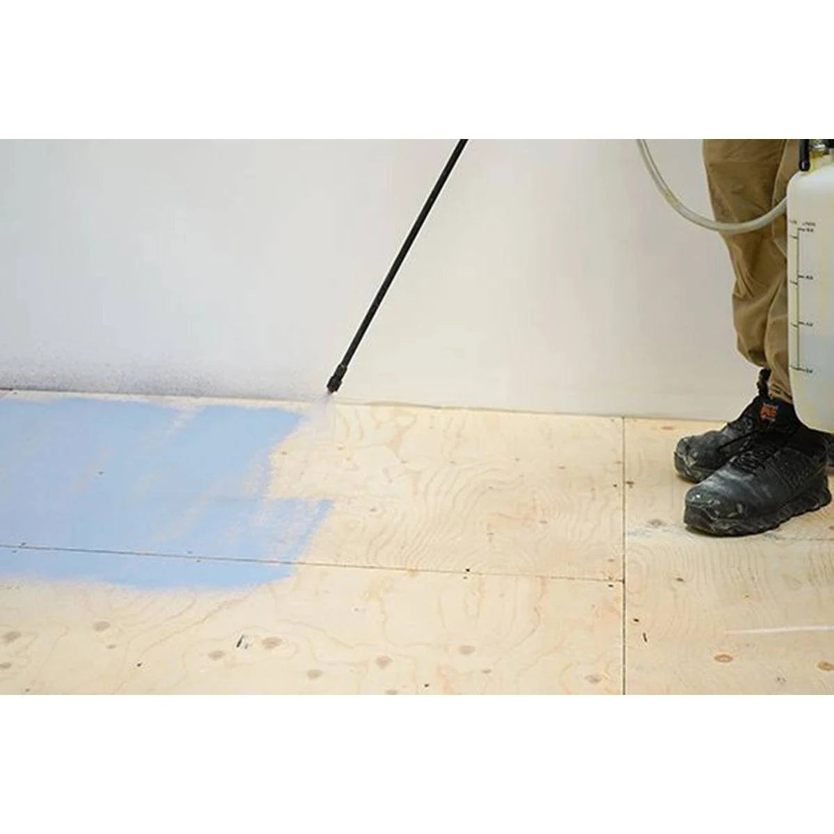 Schluter PRIMER-PS being sprayed on to wood substrate