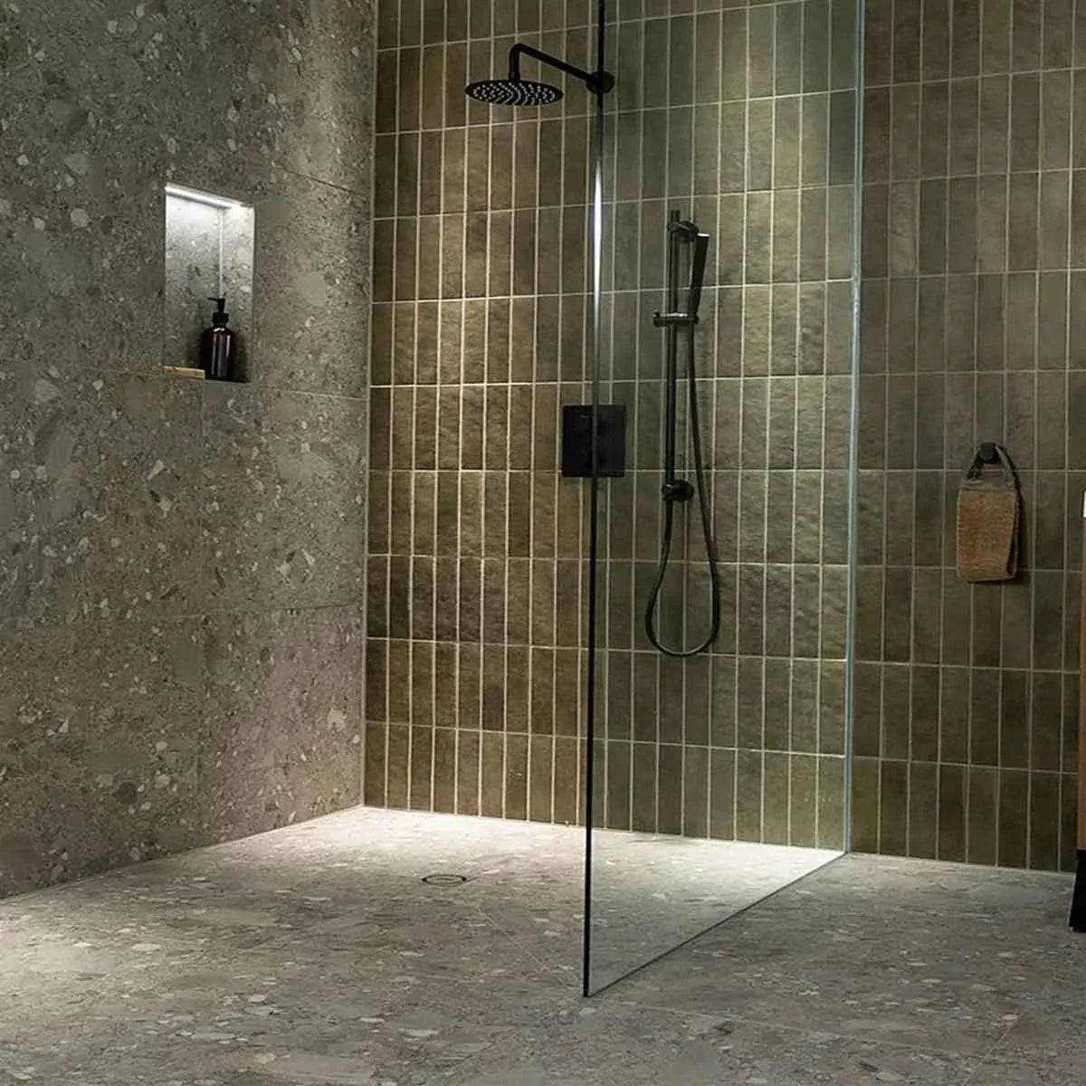 Schluter Kerdi-Board SNLT in finished dark color tiled bathroom