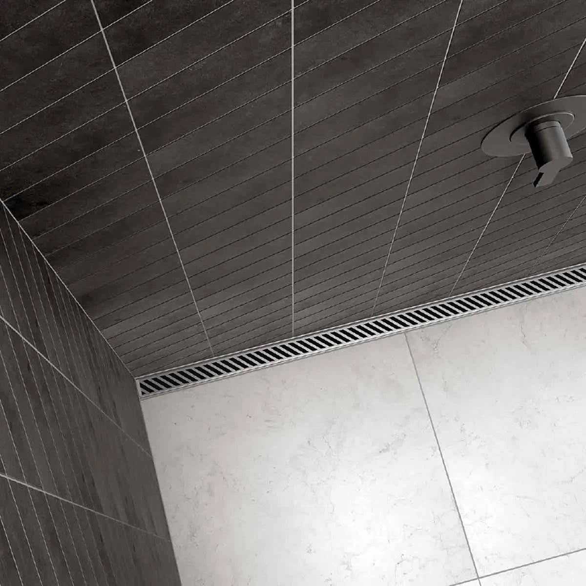 The KERDI-LINE-VARIO Linear Drain in bathroom black tile